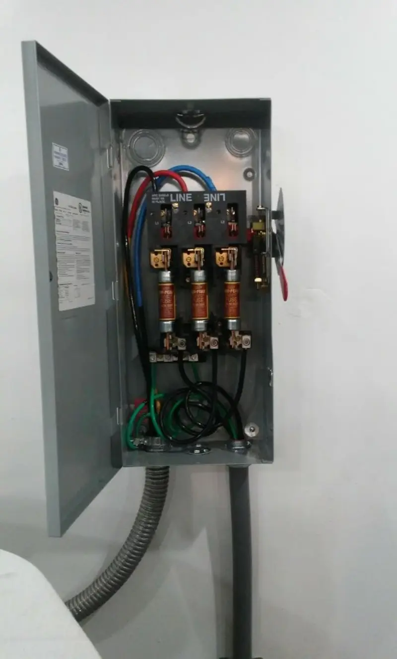 Three-phase disconnect switch installed for Smoke Detector Installation in Parsons